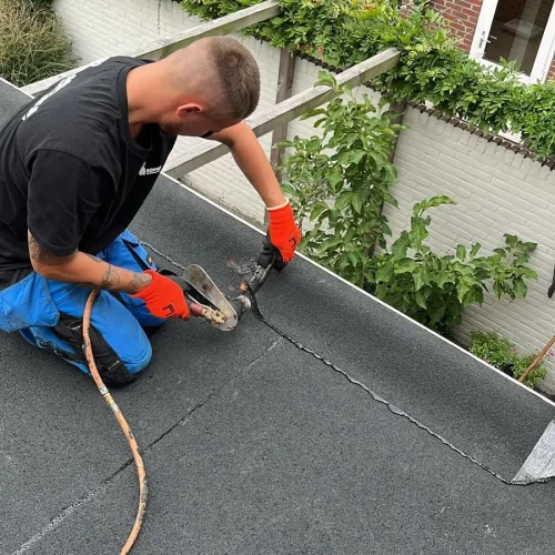 Plat dak dakdekker Gold Dakonderhoud BV